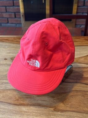The North Face Coral-Red Lightweight Cap with White Logo